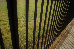 wrought-iron-fencing-abstract-geometry-grass-bac-2023-11-27-05-14-26-utc